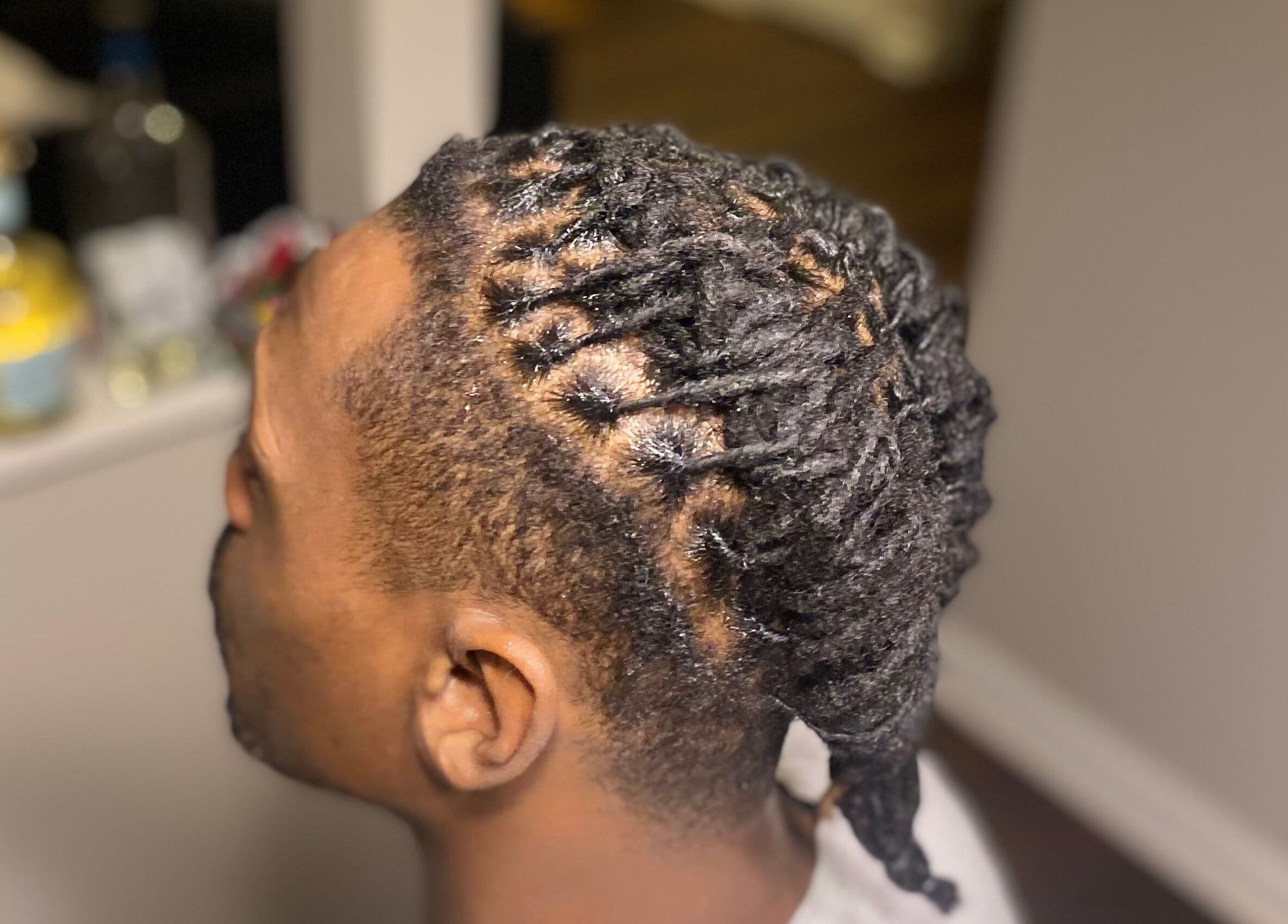 Intricate dreadlock style at Dreads by Day in Decatur, Georgia, US showcasing expert styling.