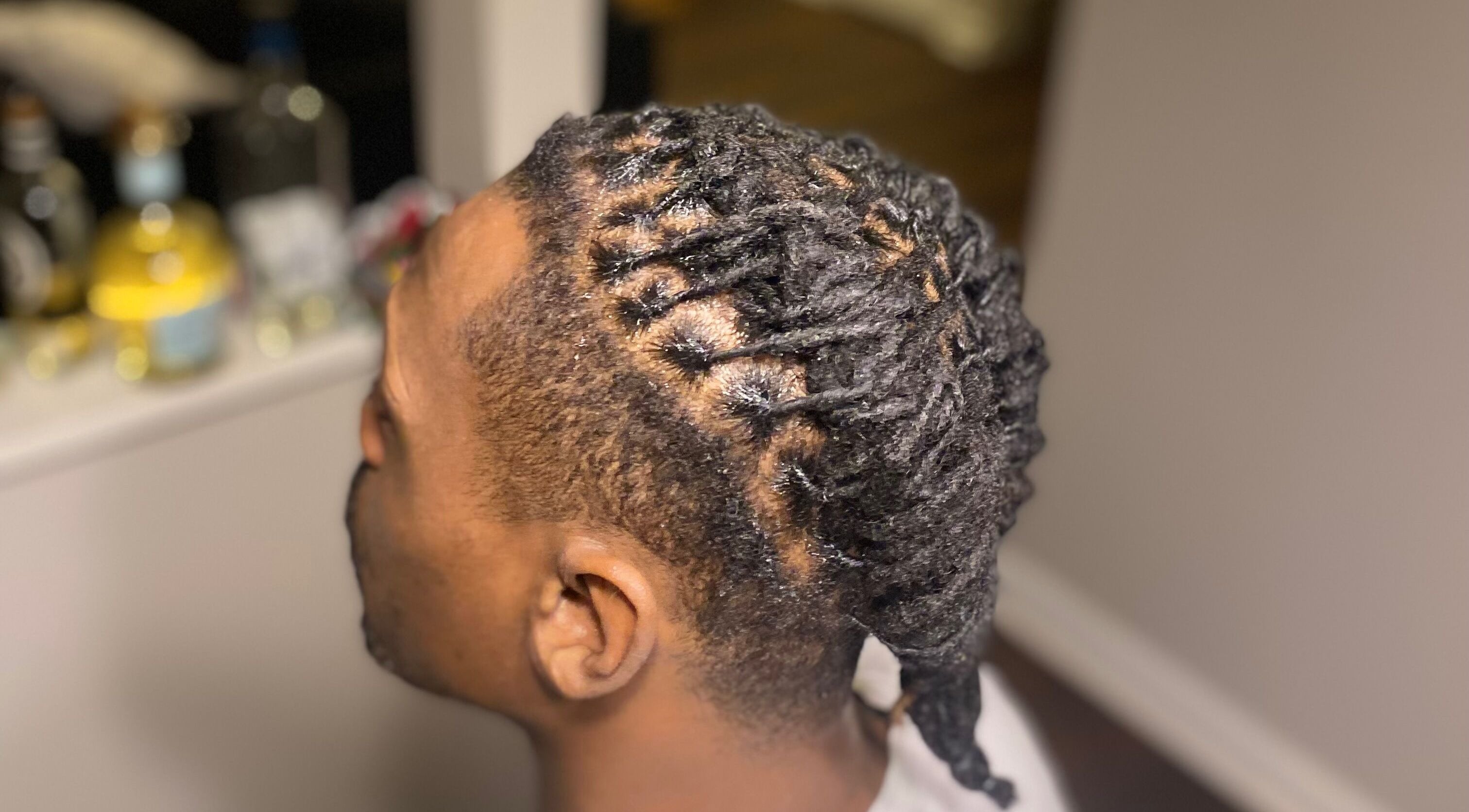 Intricate dreadlock style at Dreads by Day in Decatur, Georgia, US showcasing expert styling.
