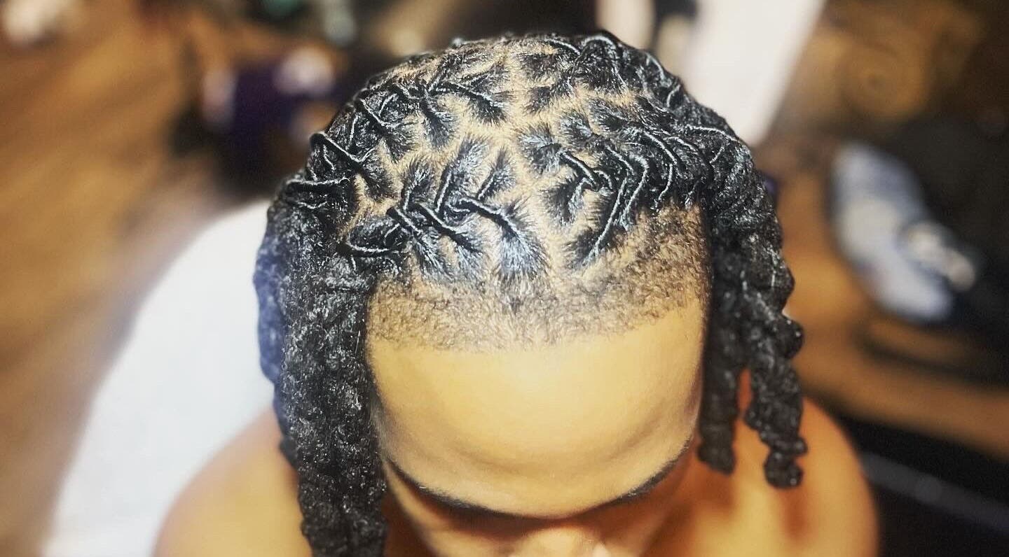 Detailed twist hairstyle at Dreads by Day in Decatur, Georgia, US, showcasing professional hair design.