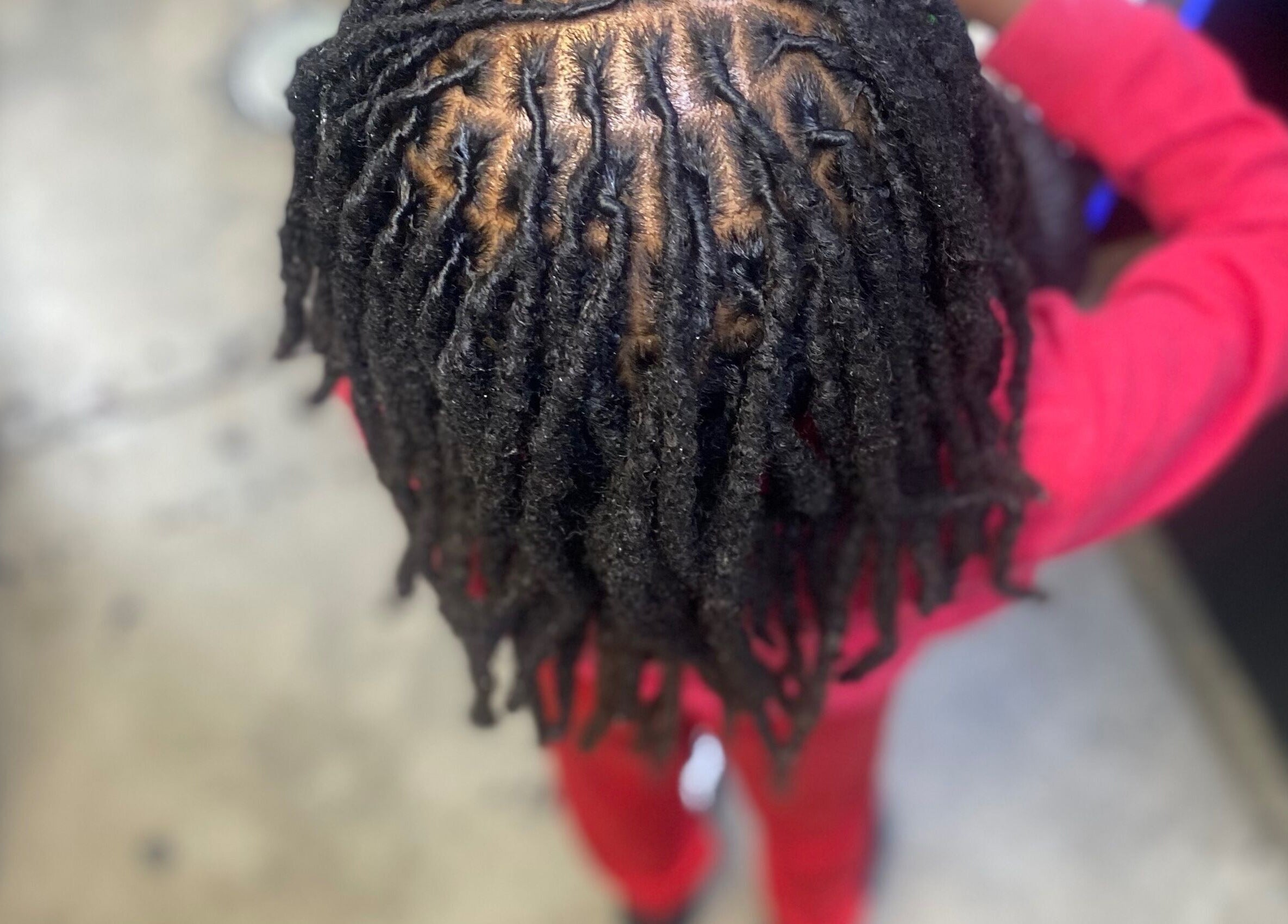 Stylishly twisted dreads at Dreads by Day, Decatur, Georgia, US, showcasing expert craftsmanship.