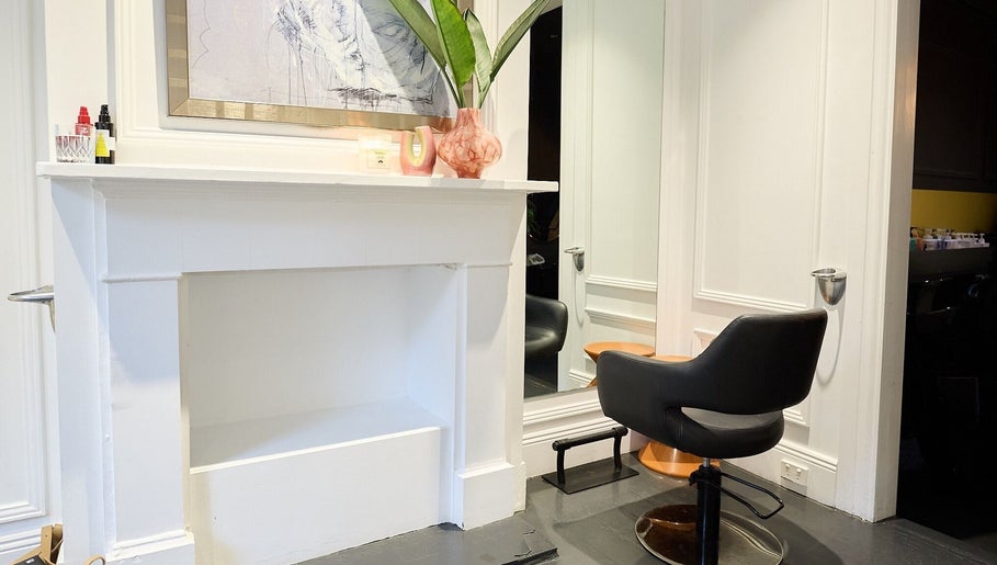 Elegant salon chair at Jade Clifton Hair, Paddington, New South Wales, AU showcasing modern design.