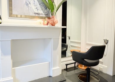 Elegant salon chair at Jade Clifton Hair, Paddington, New South Wales, AU showcasing modern design.