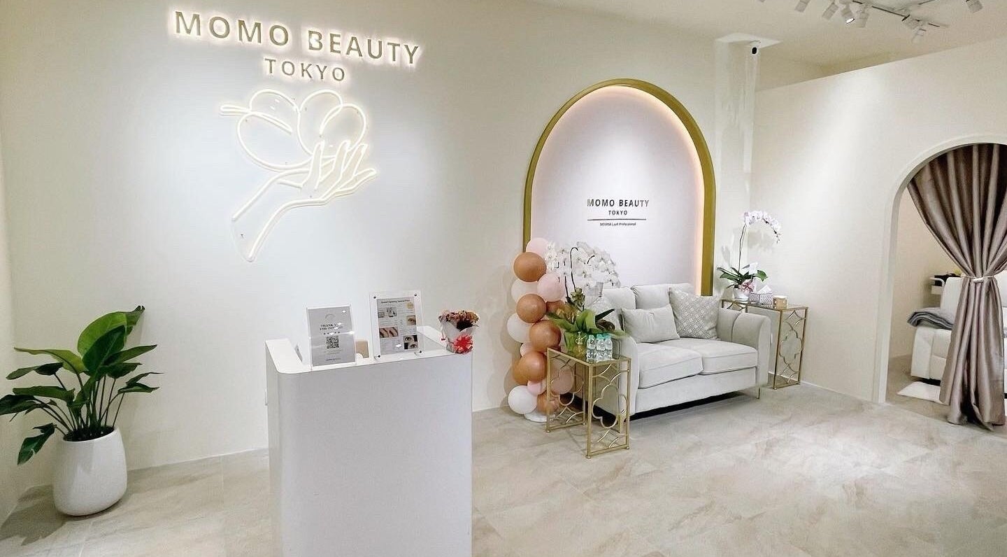 Chic interior of Momo Beauty Tokyo at Bukit Bintang, MY with plush seating and soft lighting.