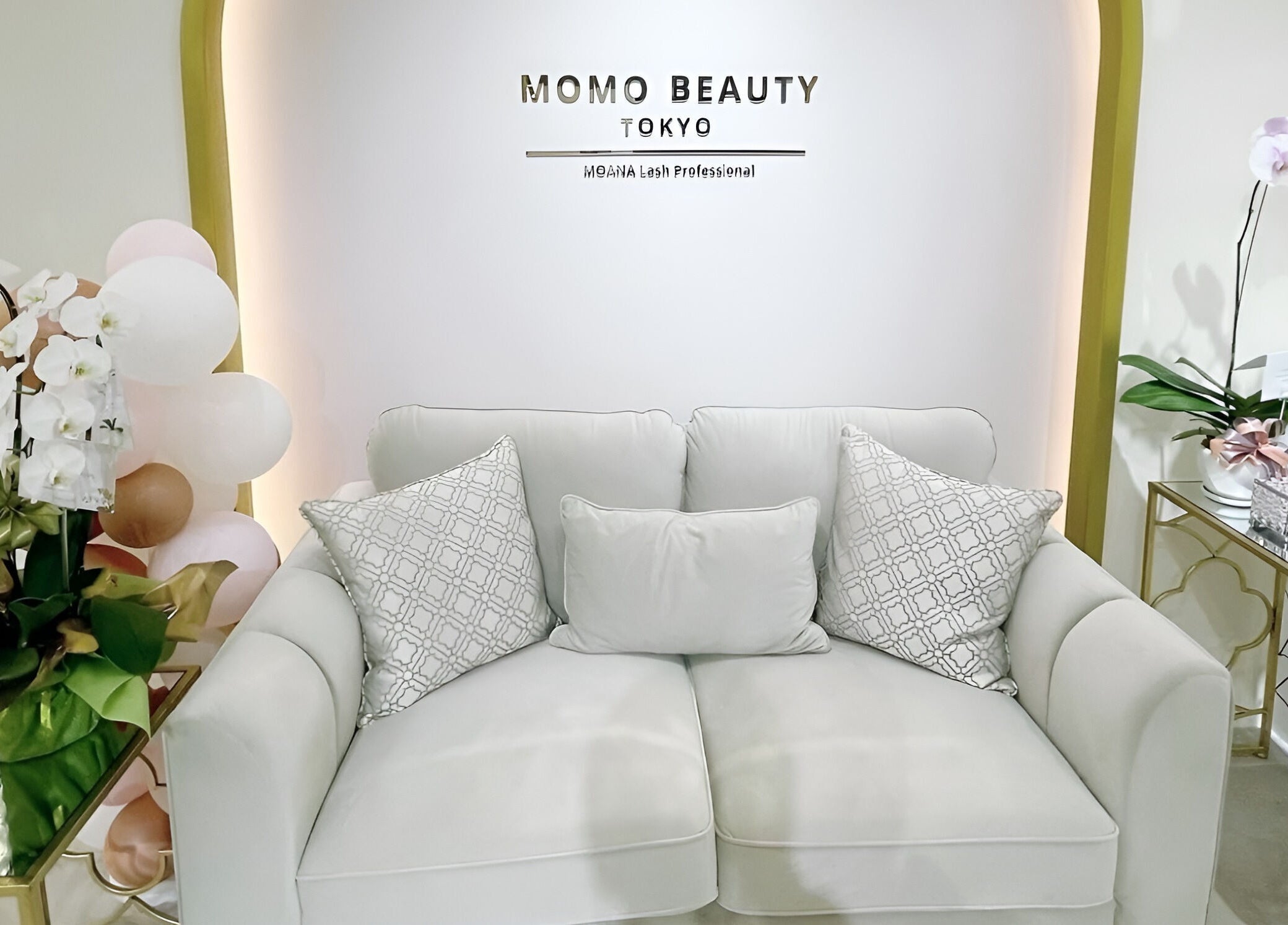 Luxurious seating area at Momo Beauty Tokyo in Bukit Bintang, MY with chic decor and comfortable sofa.