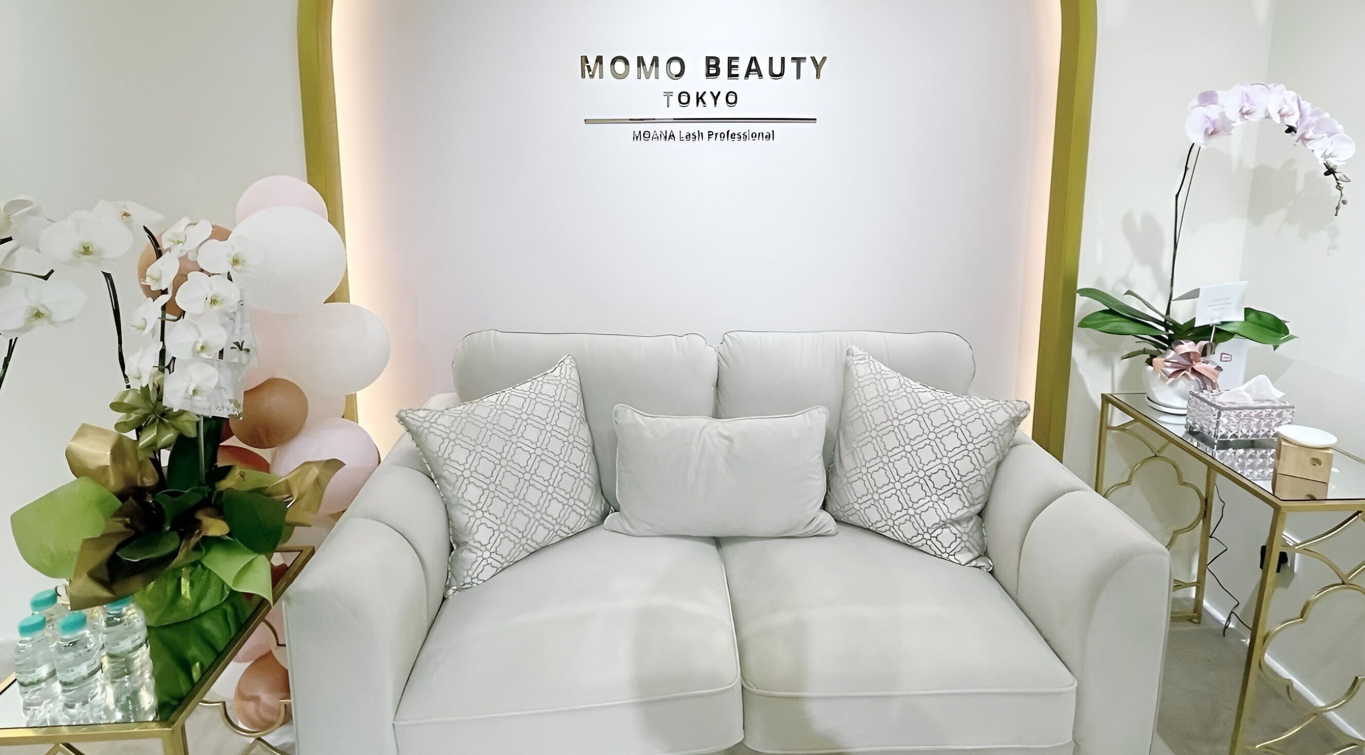 Luxurious seating area at Momo Beauty Tokyo in Bukit Bintang, MY with chic decor and comfortable sofa.