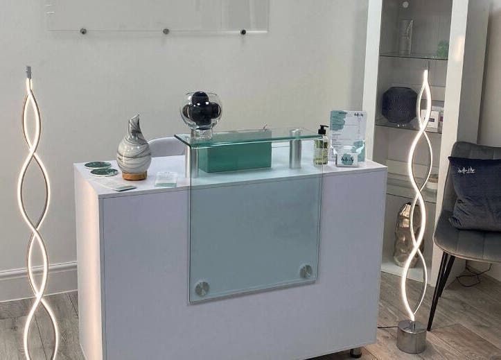 Chic reception area at Mollie Elise Aesthetics, Chorley, England, GB, featuring modern design and lighting.