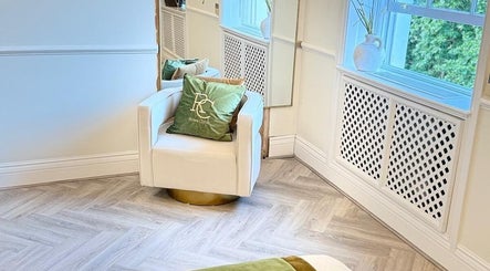 Elegant seating and decor at Rose Beauty Clinic, London, England, GB enhance relaxation.
