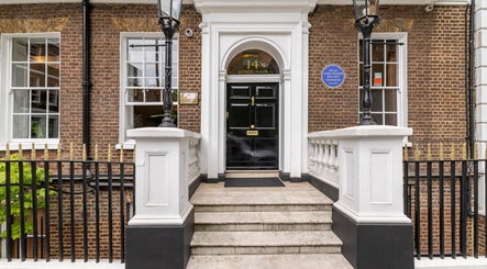 Grand entrance of Rose Beauty Clinic in London, England, GB with classic architecture.