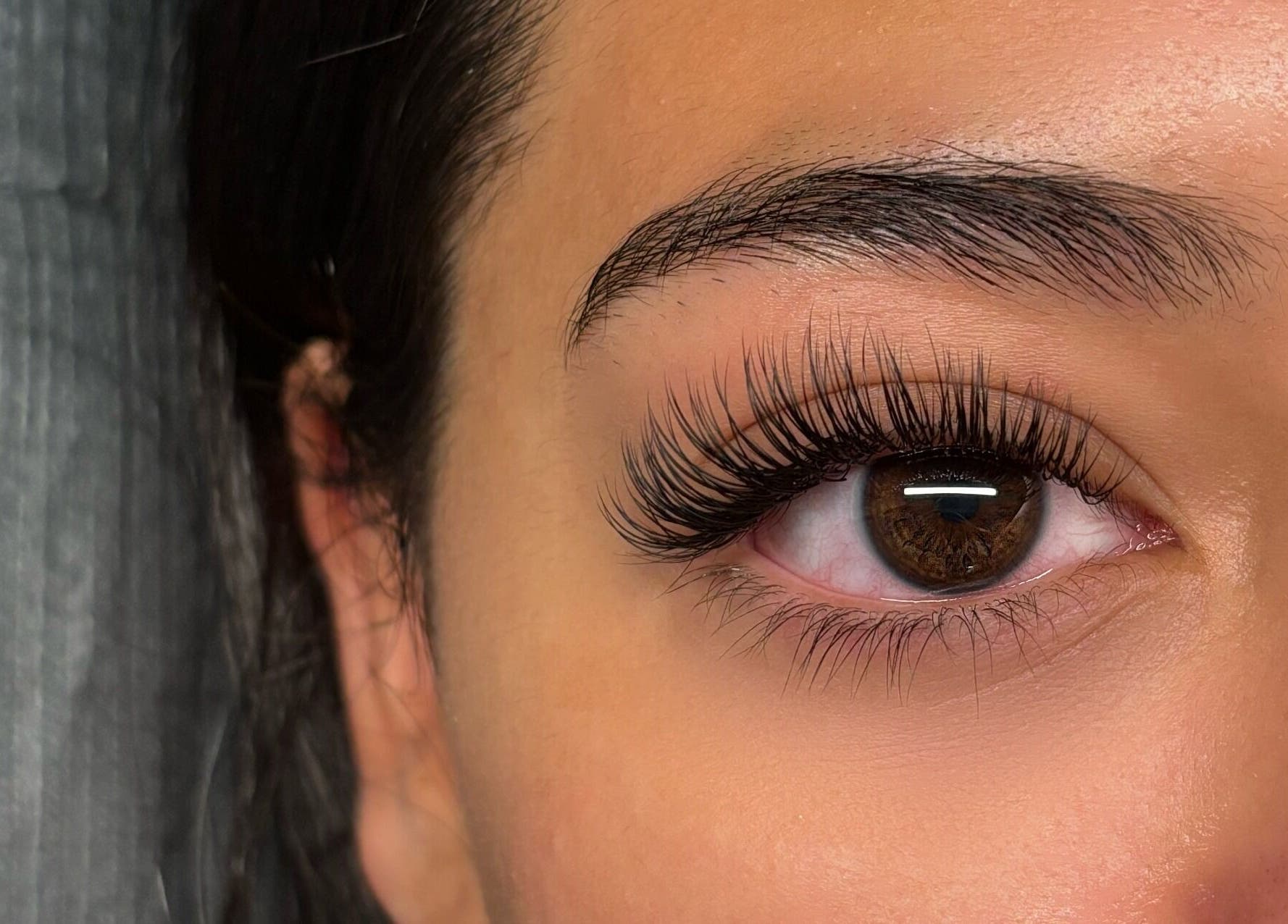 Close-up of eye with elegant eyelash extensions at Lunaria Lash Loft, Barrie, Ontario, CA.