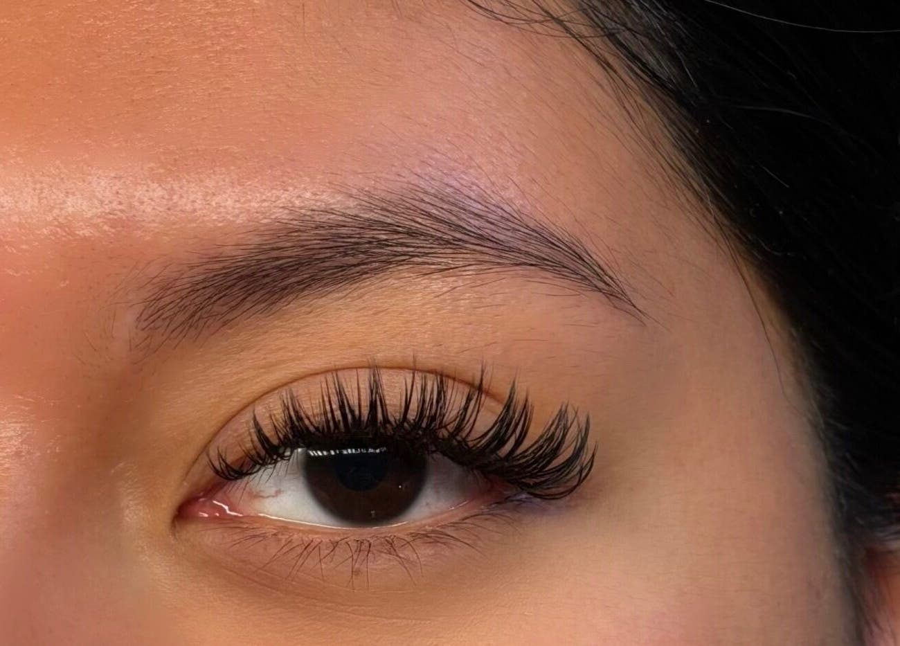 Close-up of styled lashes at Lunaria Lash Loft, Barrie, Ontario, CA, showcasing expert lash extensions.