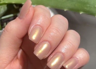 Elegant polished nails at Katies Beauty Room in Weston-super-Mare, England, GB showcasing a glossy finish.