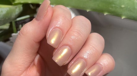 Elegant polished nails at Katies Beauty Room in Weston-super-Mare, England, GB showcasing a glossy finish.