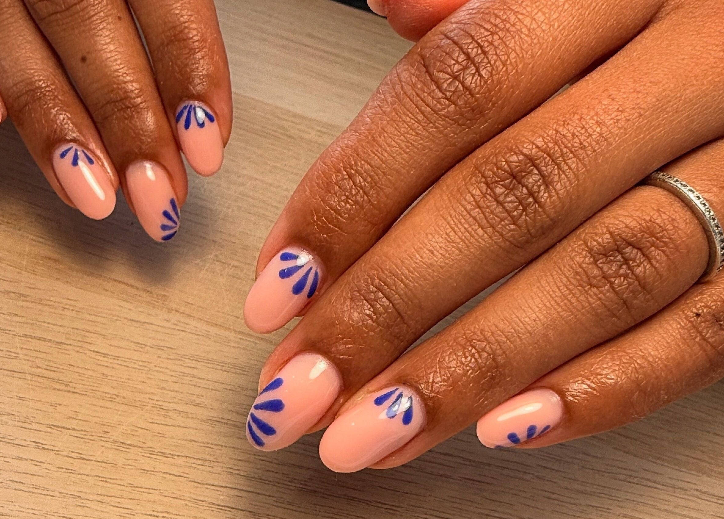 Elegant blue nail art on natural nails at Maybe Beauty Studio, Tadcaster, England, GB.