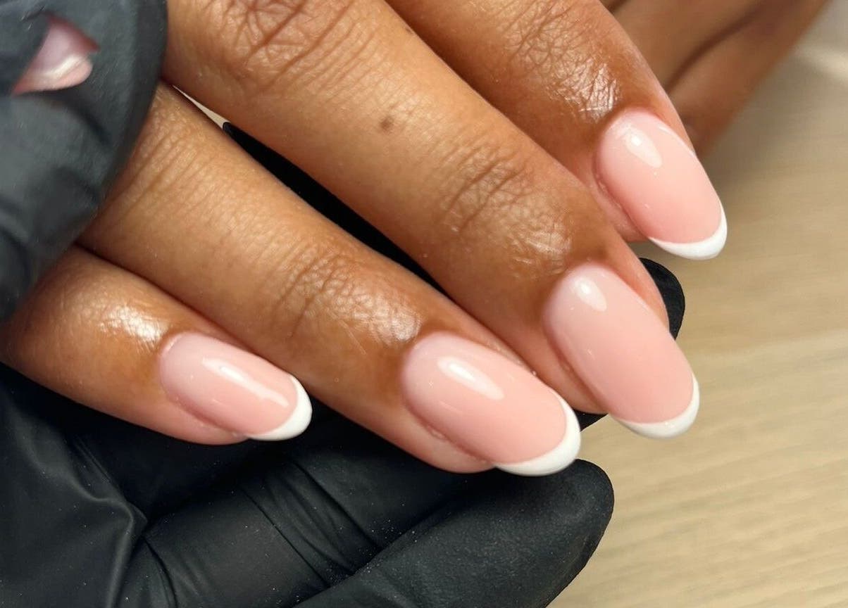 French manicure at Maybe Beauty Studio, Tadcaster, England, GB, showcasing glossy pink nails with white tips.