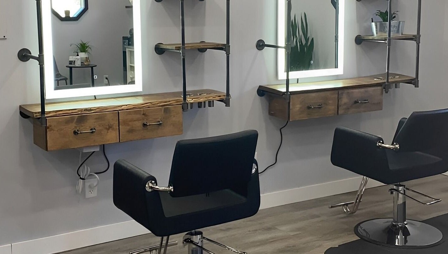Modern styling chairs and mirrors at T'Hairapy Studio in Kenosha, Wisconsin, US.