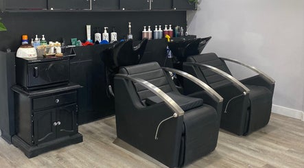 Modern salon chairs and products at T'Hairapy Studio, Kenosha, Wisconsin, US, offering premium beauty care.