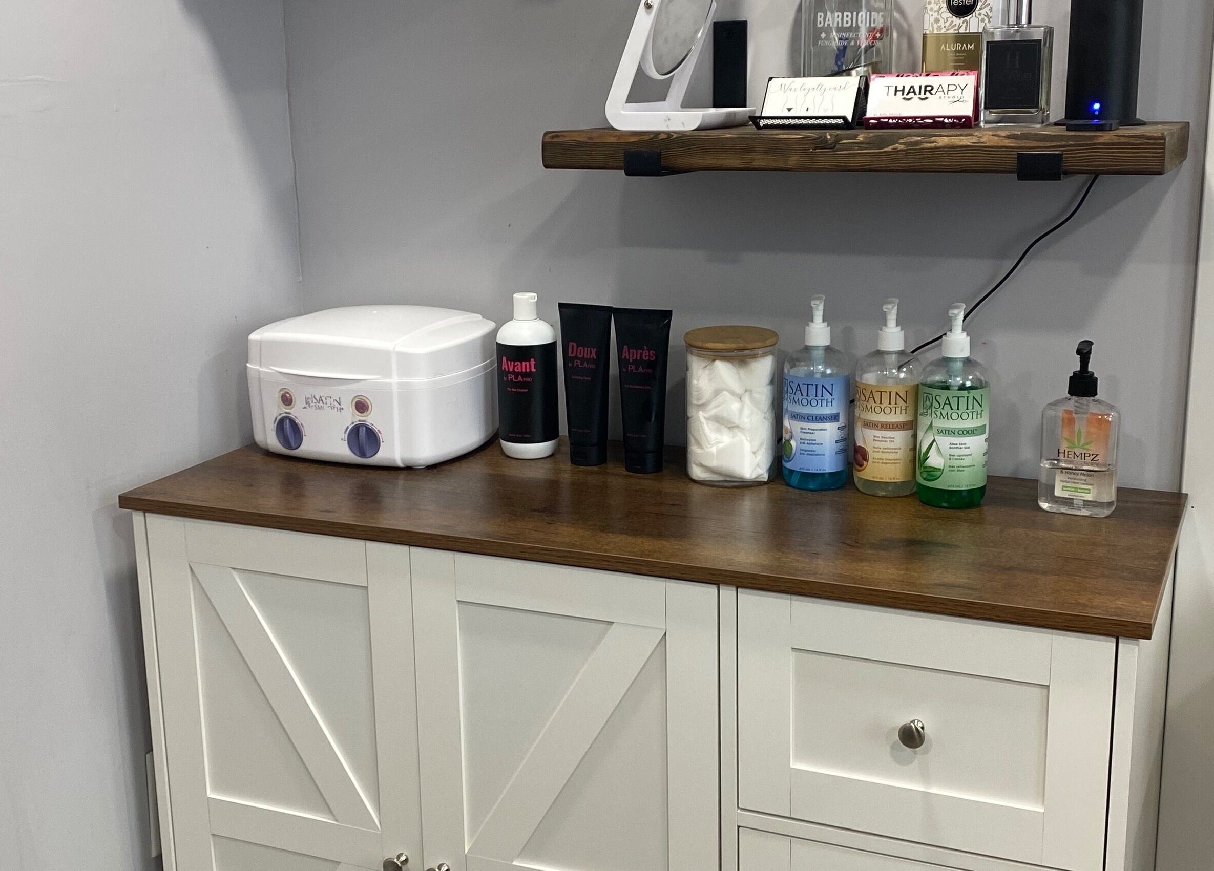 T'Hairapy Studio beauty product display in Kenosha, Wisconsin, US showcasing skincare essentials.