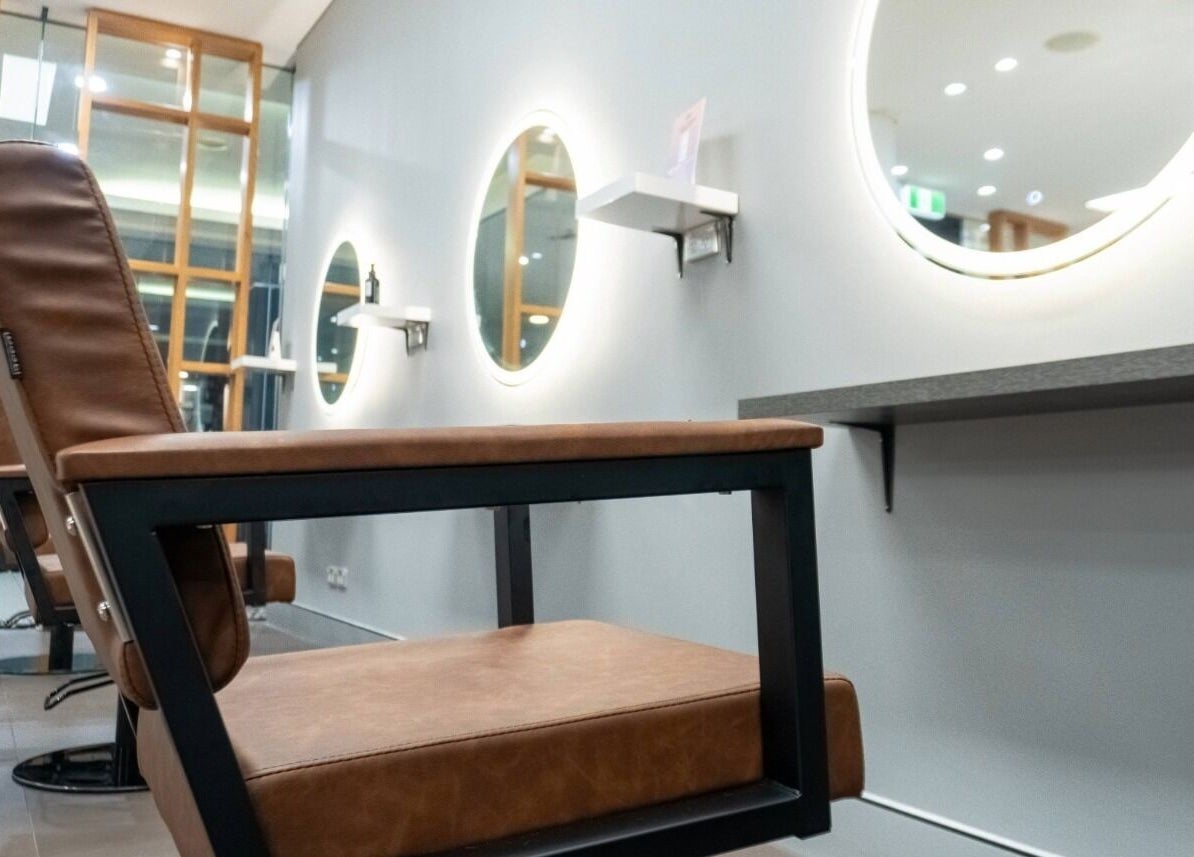 Chic salon chairs at Cuts By Carella, Cairns City, Queensland, AU offer comfort and style for a premium beauty experience.