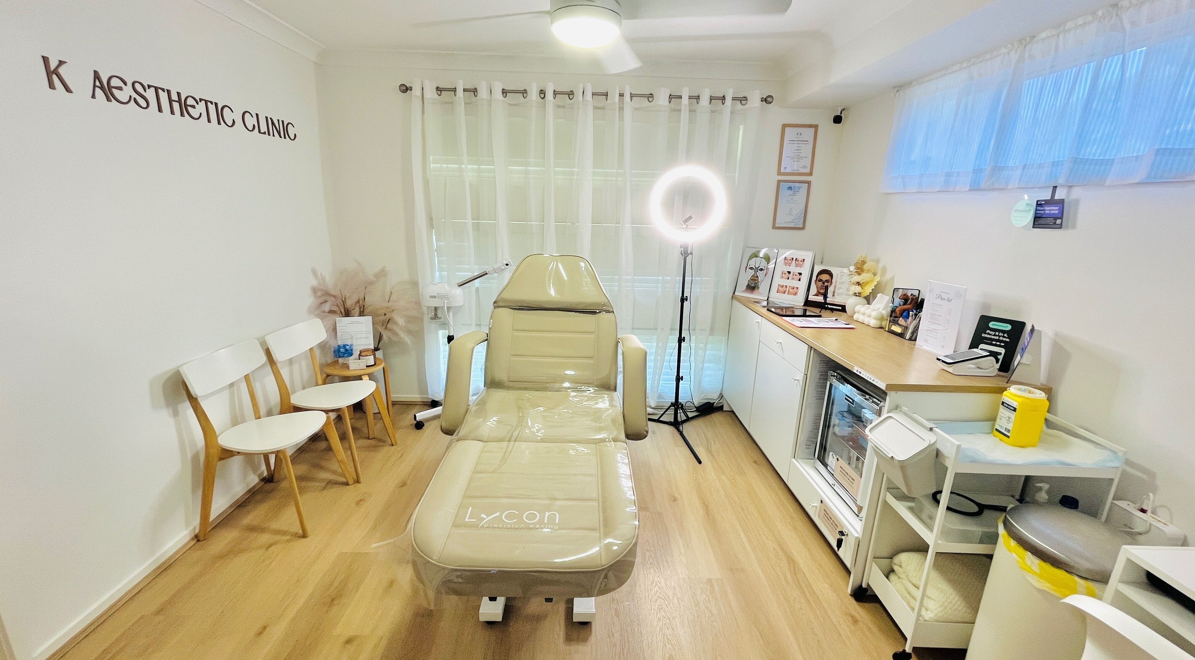 K Aesthetic Clinic treatment room with modern decor in Fitzgibbon, Queensland, AU.