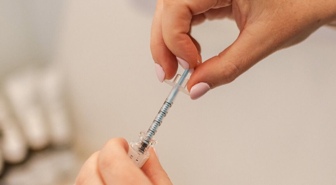 Close-up of injection being prepared at Beautiful is You Ltd - Waihi, Waihi Beach, Bay Of Plenty Region, NZ.