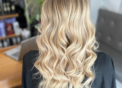 Elegant blonde waves hairstyle at Adele Branch Hair, Kirkintilloch, Scotland, GB.