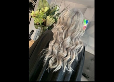 Silver wavy hair styled at Adele Branch Hair in Kirkintilloch, Scotland, GB.