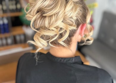 Blonde hair with elegant curls styled at Adele Branch Hair in Kirkintilloch, Scotland, GB.