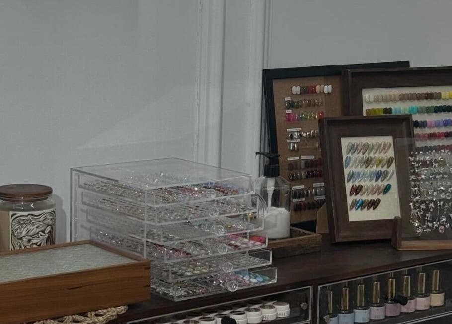 Nail art palettes displayed at Nayii Atelier奈野, showcasing vibrant options in London, England, GB.