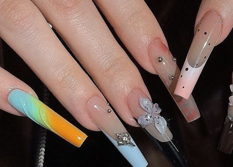 Elegant nail art at Nayii Atelier奈野, London, England, GB. Featuring diverse artistic designs.