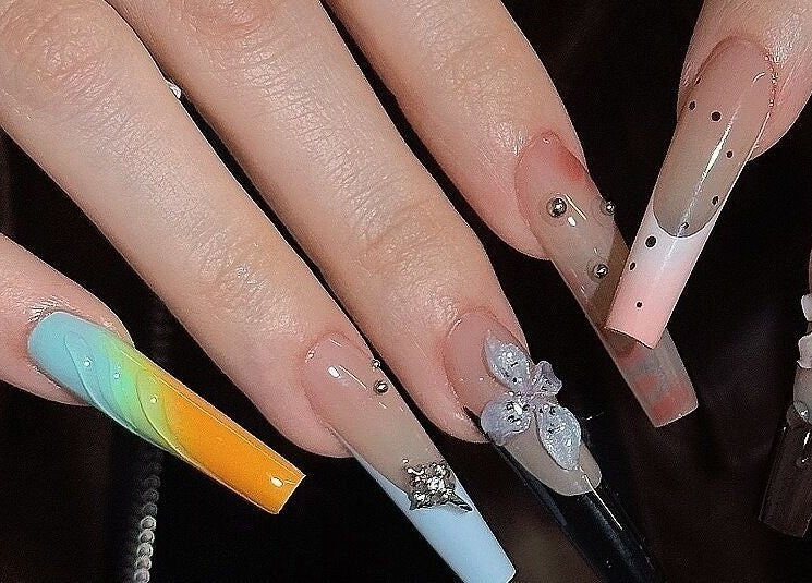 Elegant nail art at Nayii Atelier奈野, London, England, GB. Featuring diverse artistic designs.