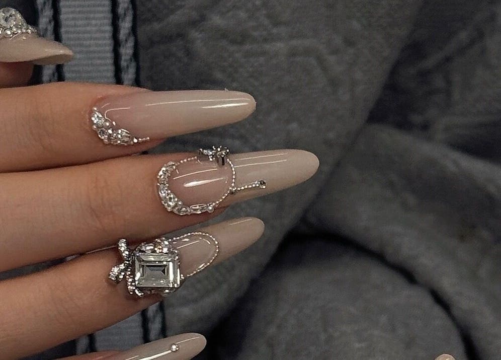 Intricate nail art with crystal accents at Nayii Atelier奈野, London, England, GB.