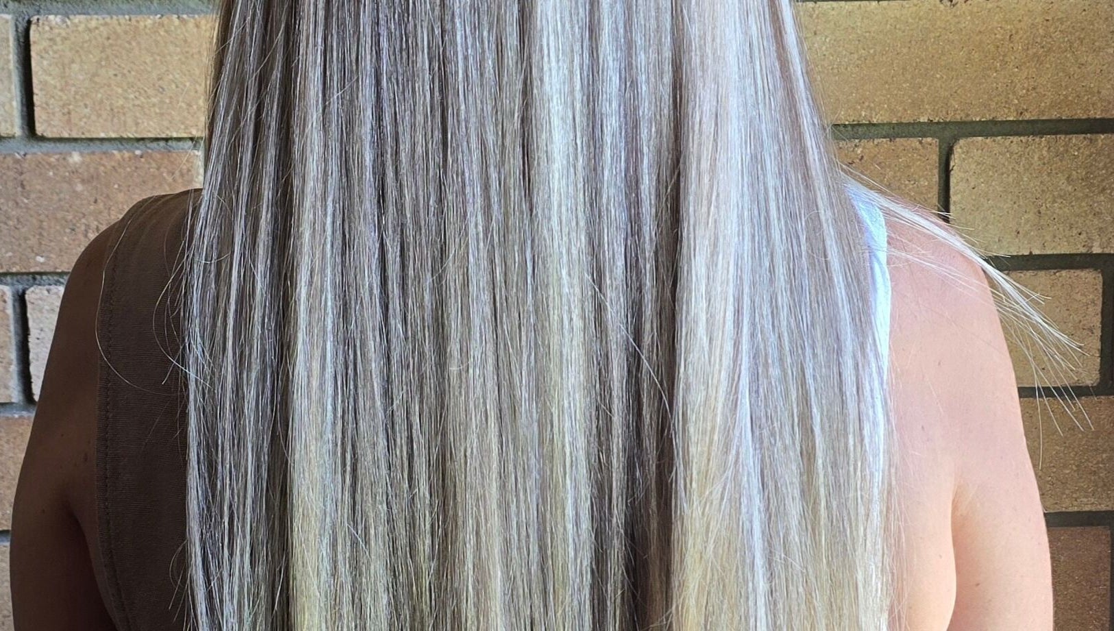 Beautiful long straight silver-grey hair styled at Aisling Studio, East Mackay, Queensland, AU.