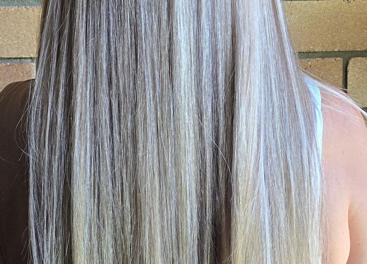 Beautiful long straight silver-grey hair styled at Aisling Studio, East Mackay, Queensland, AU.