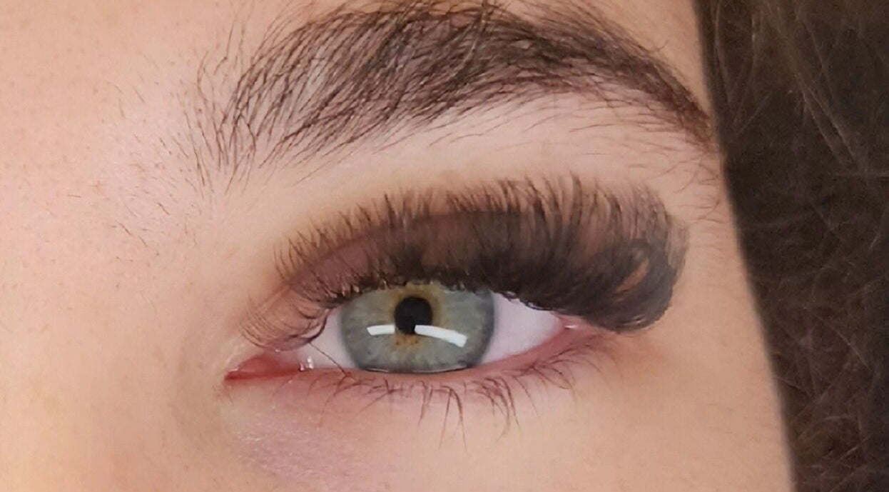 Close-up of enhanced eyelashes at Aisling Studio, East Mackay, Queensland, AU offering expert beauty services.