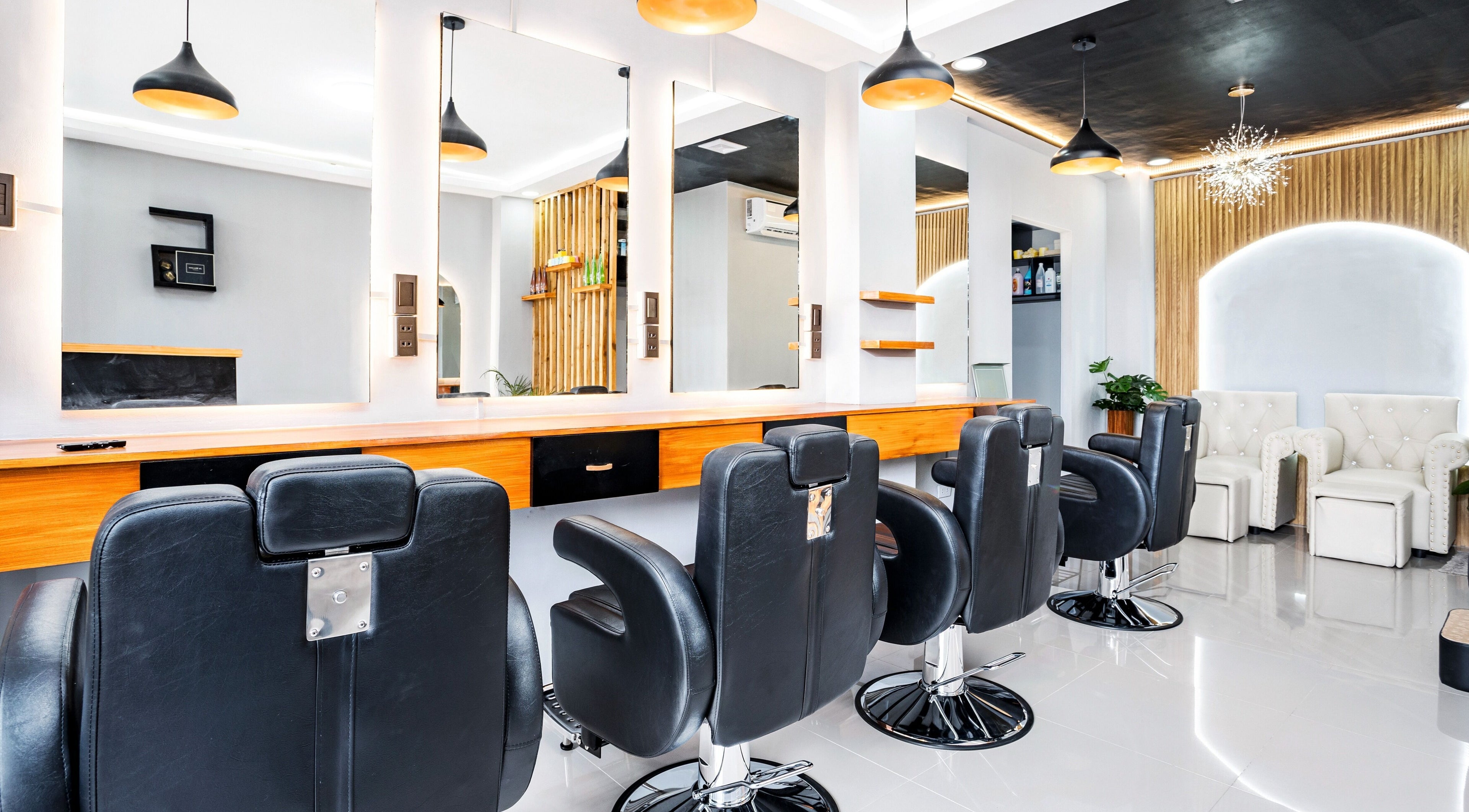 Modern interior of Slick and Dapper Barbershop and Salon Capitol in Cebu City, Central Visayas, PH.