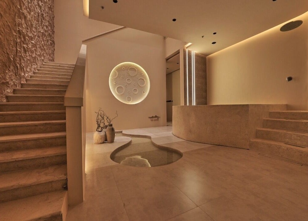 Elegant interior at Via Sand Spa | Men, Riyadh, featuring modern stairs and a serene ambiance.