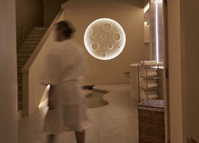 Elegant spa interior at Via Sand Spa | Men, Riyadh, featuring calming lighting and plush amenities.