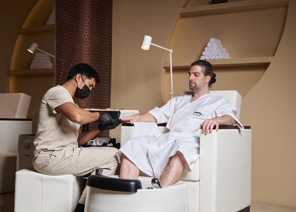 Man receiving hand treatment at Via Sand Spa | Men in Riyadh, Riyadh Province, SA.
