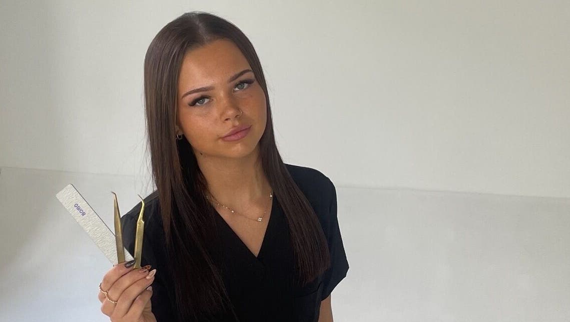 Nail technician showcasing tools at HC BEAUTY in Rossendale, England, GB.