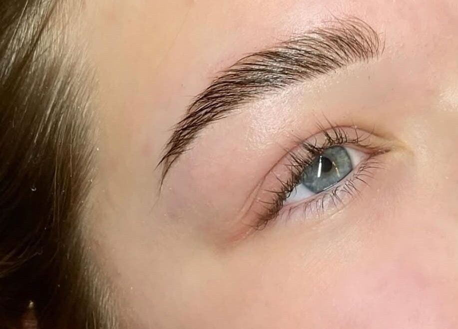 Close-up of flawlessly shaped eyebrow at HC BEAUTY, Rossendale, England, GB.