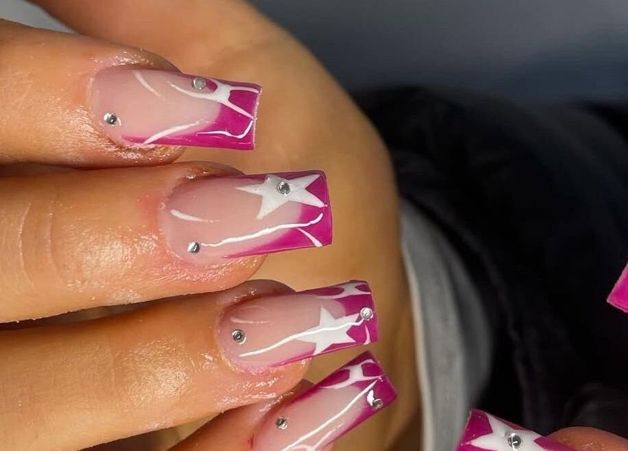Elegant pink and white star nails at HC BEAUTY in Rossendale, England, GB.