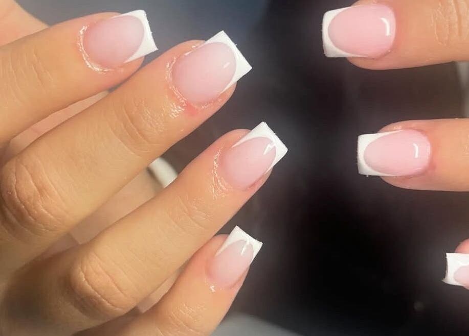 French manicure at HC BEAUTY, Rossendale, England, GB showcasing glossy finish.