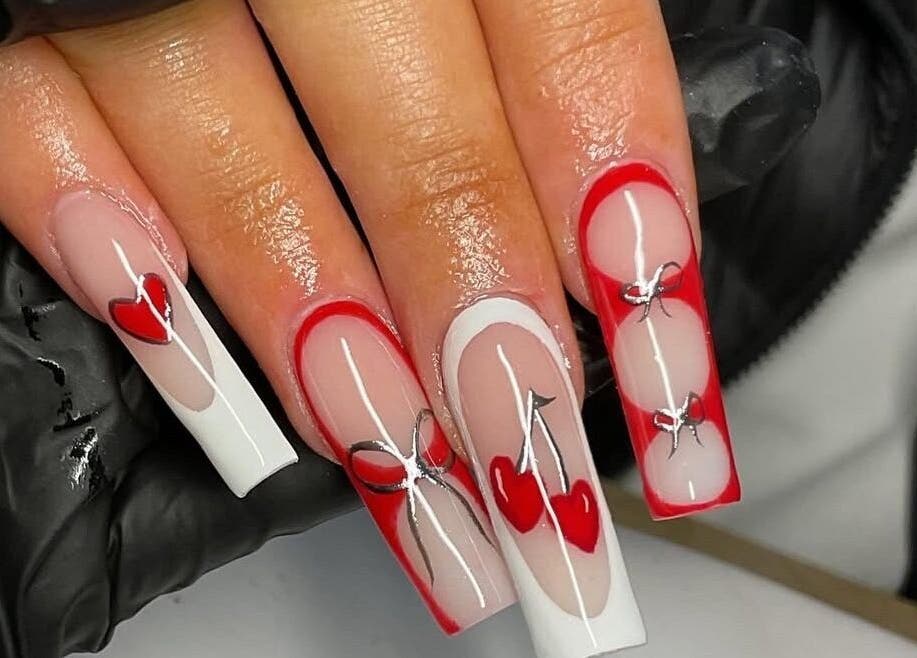Elegant heart-themed nail art at HC BEAUTY, Rossendale, England, GB, showcasing expert design and style.