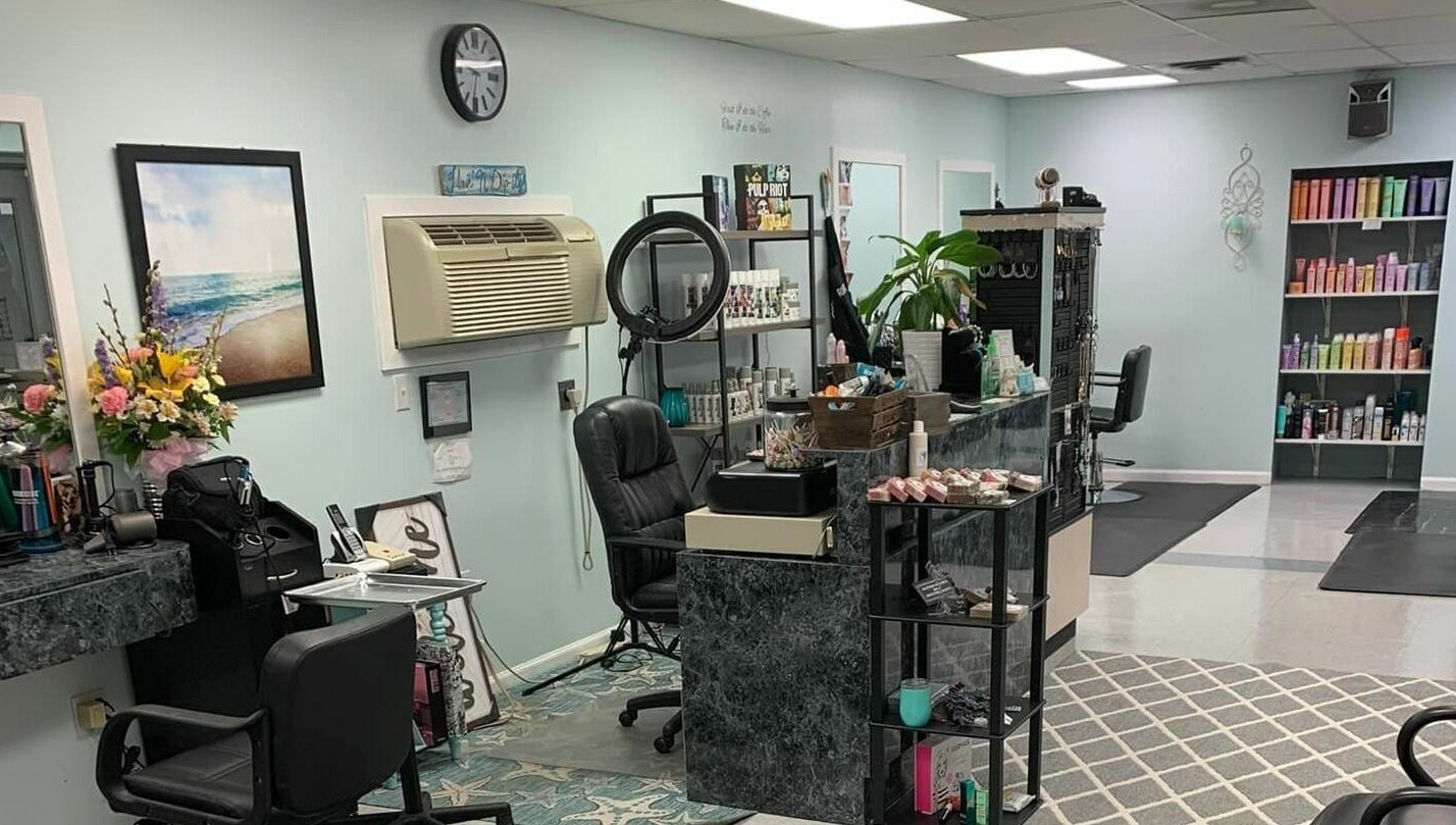 Interior of Hair'N Dip-ity in Littlestown, Pennsylvania, US, showcasing stylish decor and professional salon setup.