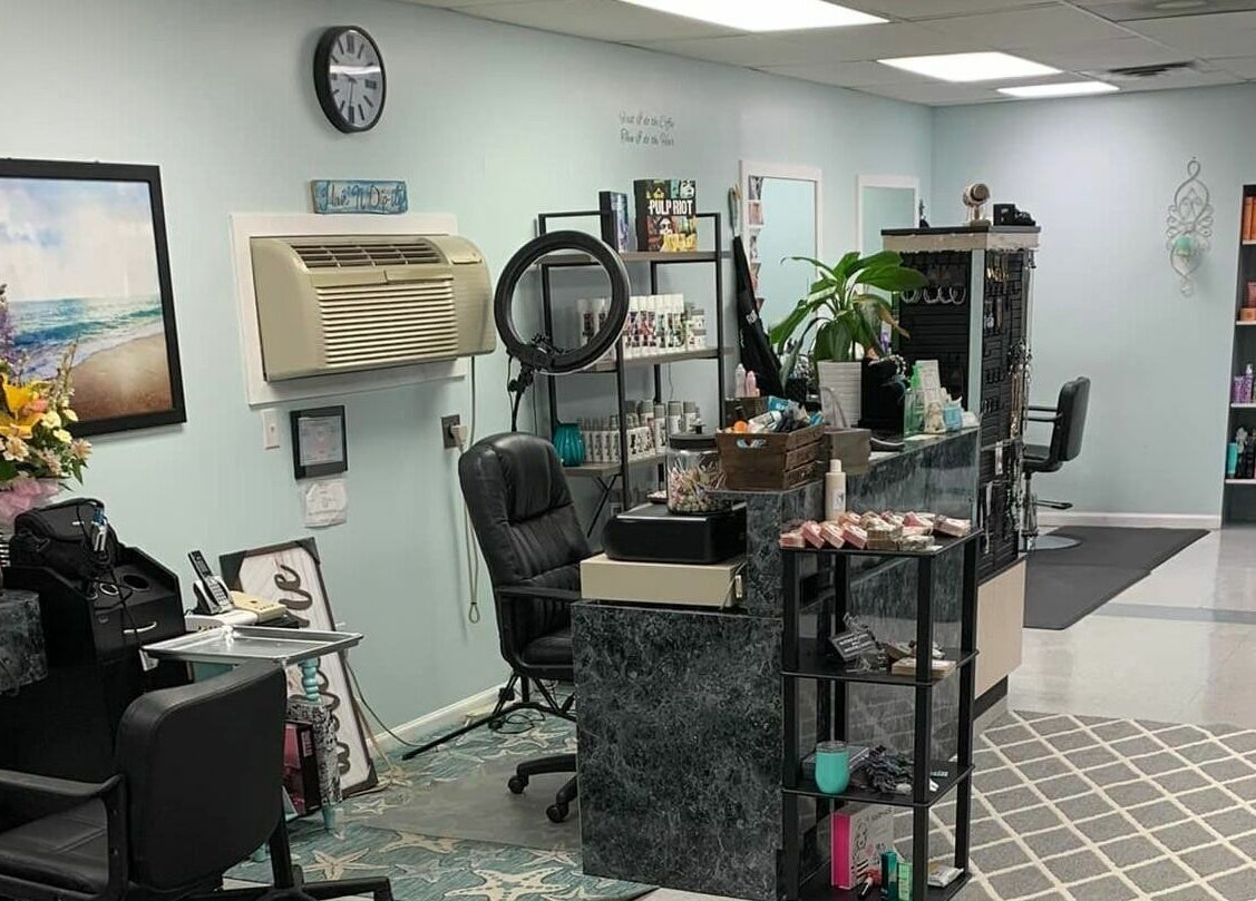 Interior of Hair'N Dip-ity in Littlestown, Pennsylvania, US, showcasing stylish decor and professional salon setup.