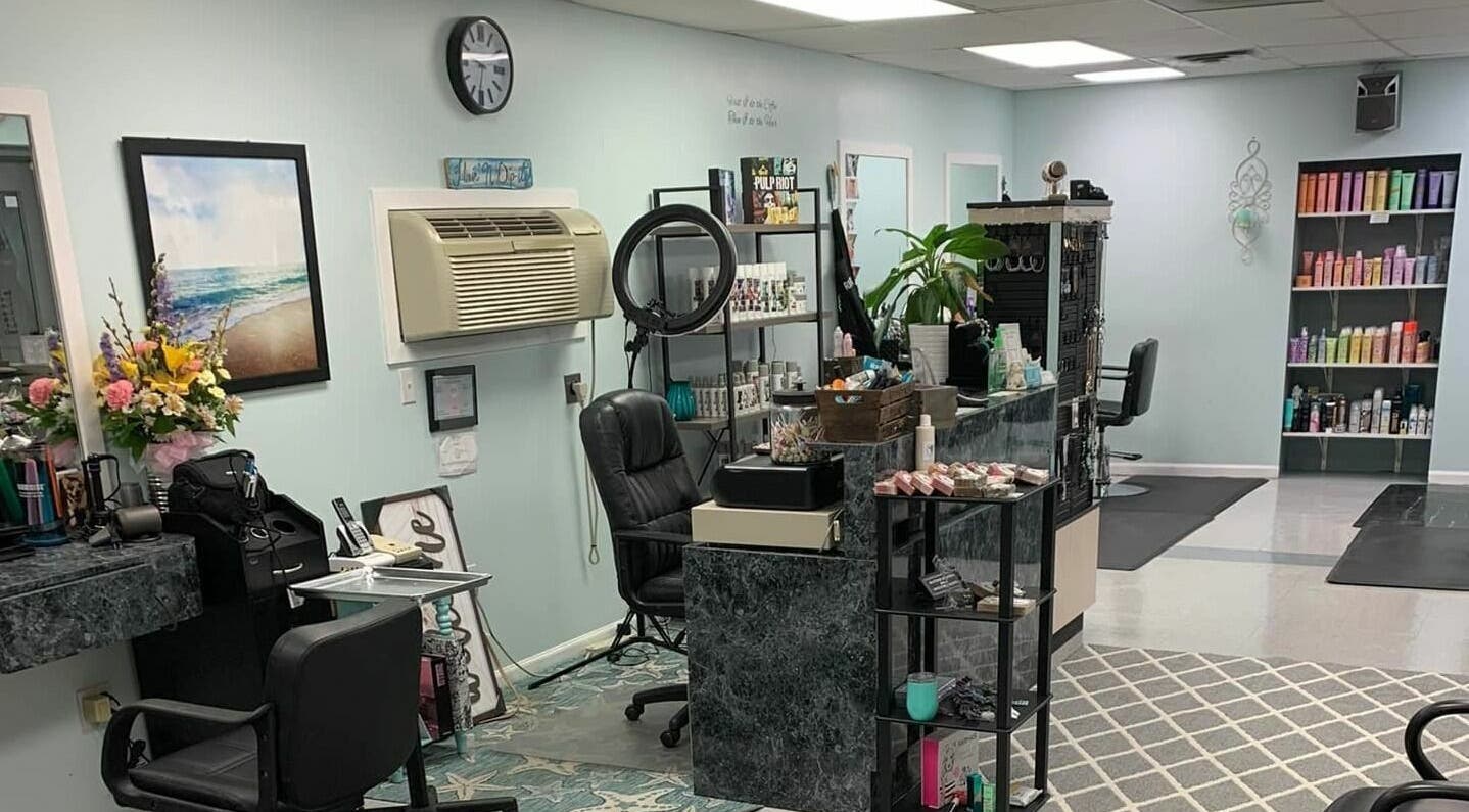 Interior of Hair'N Dip-ity in Littlestown, Pennsylvania, US, showcasing stylish decor and professional salon setup.