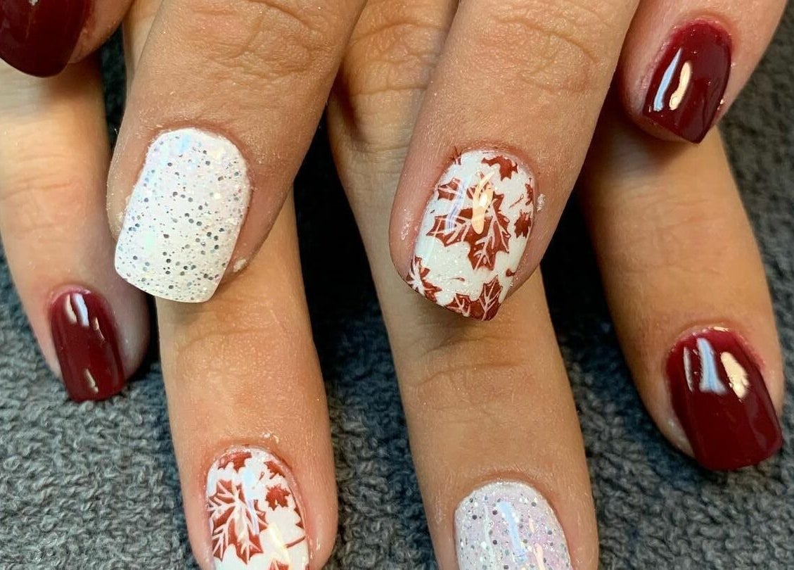 Elegant autumn-themed nail art at Hair'N Dip-ity, Littlestown, Pennsylvania, US.