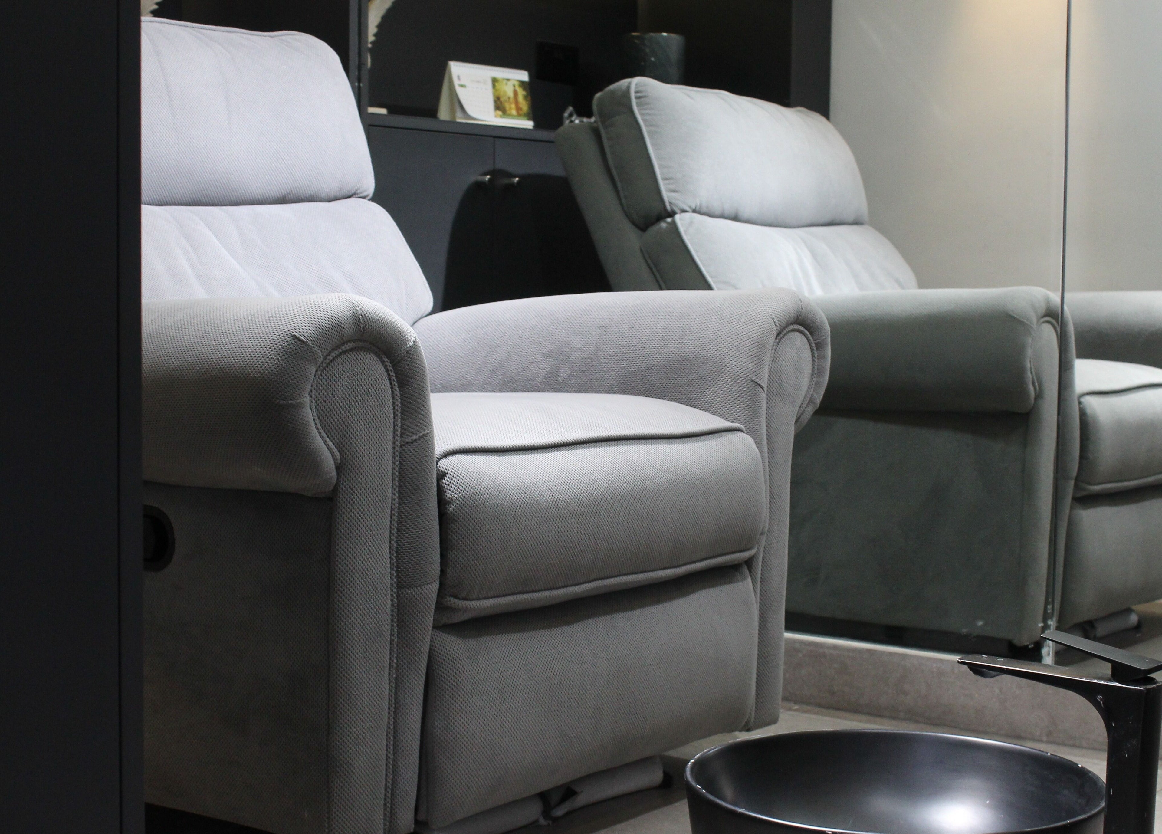 Comfortable reclining chairs at The Syndicate Gents Salon, Dubai, AE, offering a premium relaxation experience.
