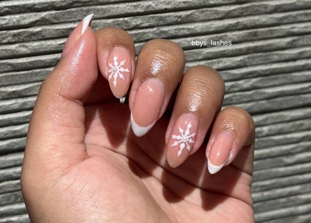 Chic snowflake nail design by Bbys Lashes & Nails in Sheffield, England, GB.