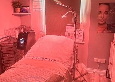 Luxurious treatment room at The Renewed Lab, Harrold, England, GB featuring a comfortable spa bed and ambient lighting.